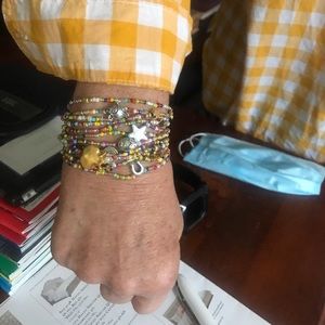 Glass beaded bracelets with charms